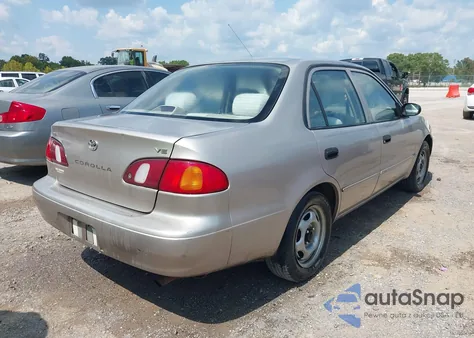 1998 Toyota Corolla Ve из США, поврежденный, VIN 2T1BR12E7WC031063
